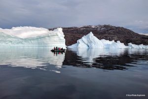 Exploring icebergs from a zodiac
